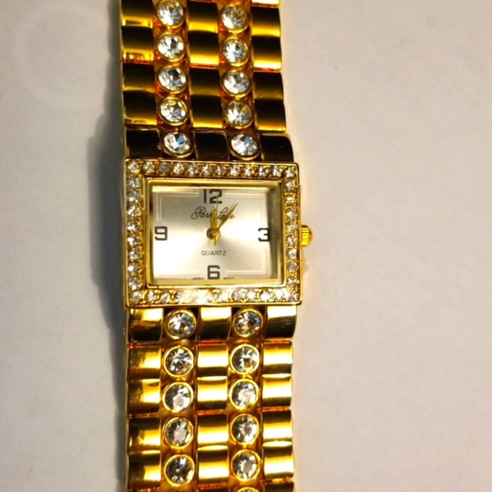 NWOT Gold tone Swarovski Crystals watch